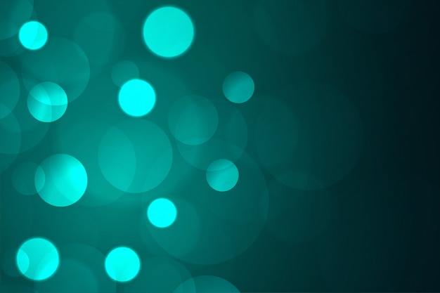 Abstract blue bokeh light on dark background