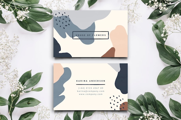 Free vector abstract business card template with pastel-colored stains