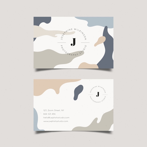 Free vector abstract business card template with pastel-colored stains