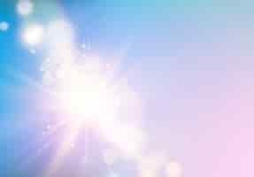 Free vector abstract rays with bokeh over blue sky