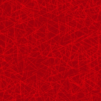赤い色の三角形のランダムに配置された輪郭の抽象的なシームレスパターン
