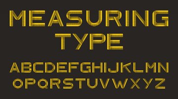 alphabet from yellow measure tape
