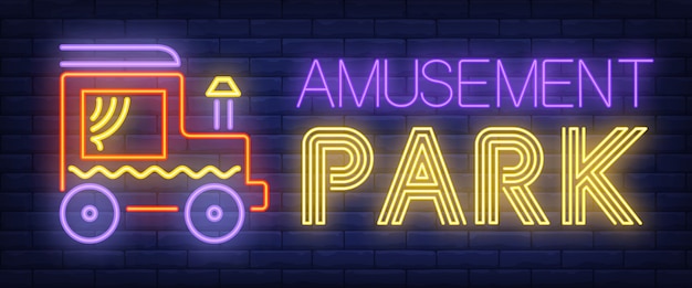 Amusement park neon text with toy car