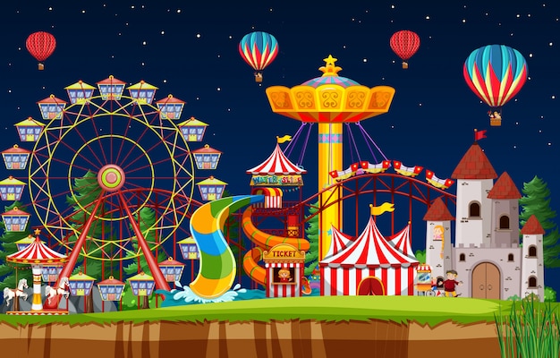 Amusement park scene at night with balloons in the sky