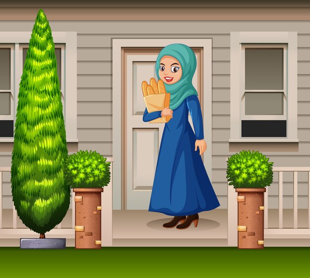 Arabian woman in front of the house