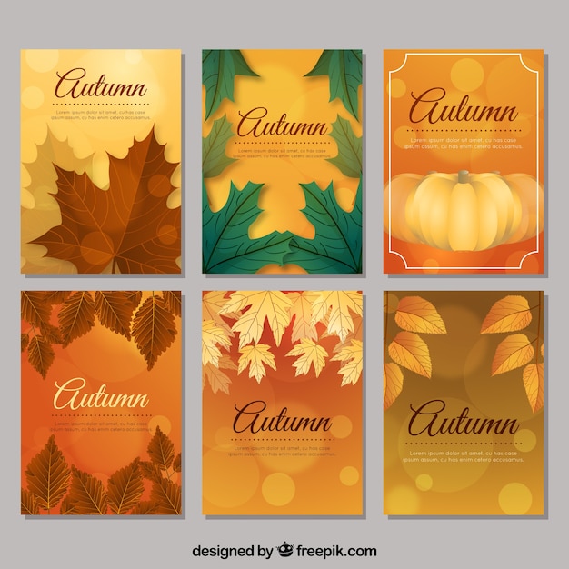 Vettore gratuito pacchetto artistico di carte autunnali con colori caldi