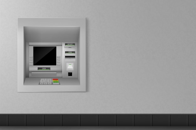 灰色の壁にATM自動預け払い機。銀行業