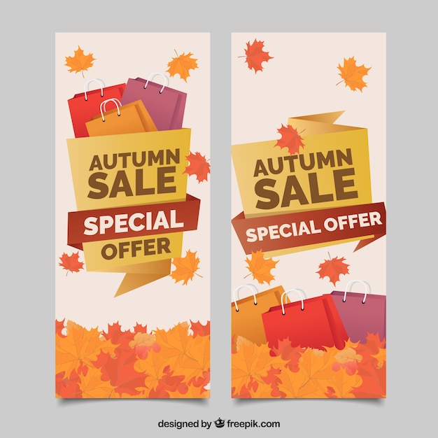 Vettore gratuito banner d'autunno con sacchetti e fogli di shopping