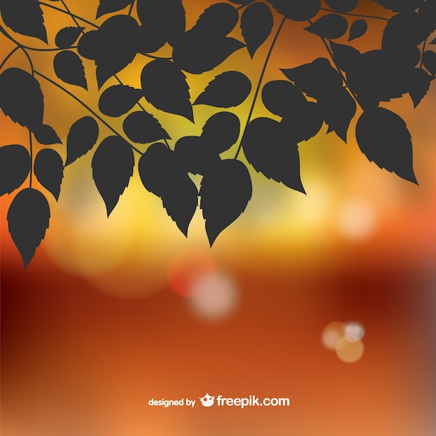 Vettore gratuito autumn leaves silhouette sfondo bokeh