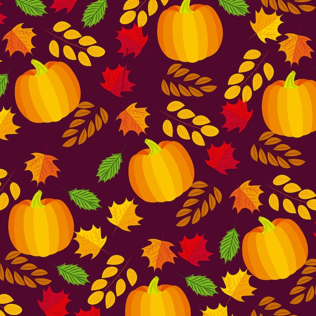Autumnal leaves and pumpkins composition