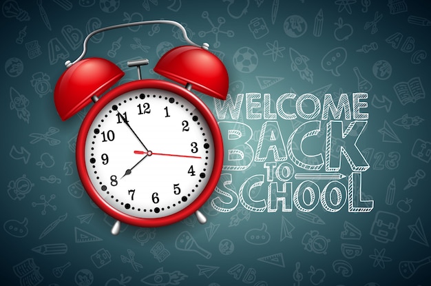 Back to school lettering with red alarm clock and typography on black chalkboard 