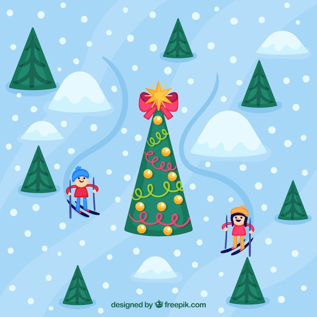 Background of children skiing and christmas tree