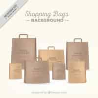 Free vector background of elegant paper bags