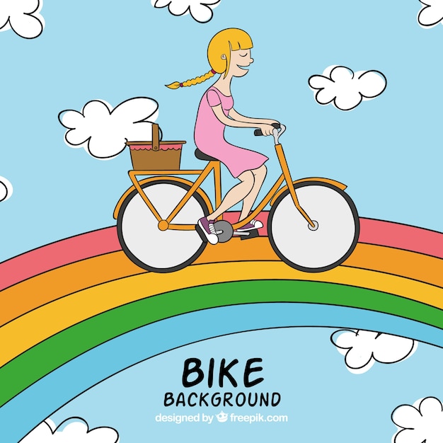 Background of girl on bicycle with hand drawn rainbow 