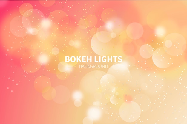 Free vector background with golden bokeh lights