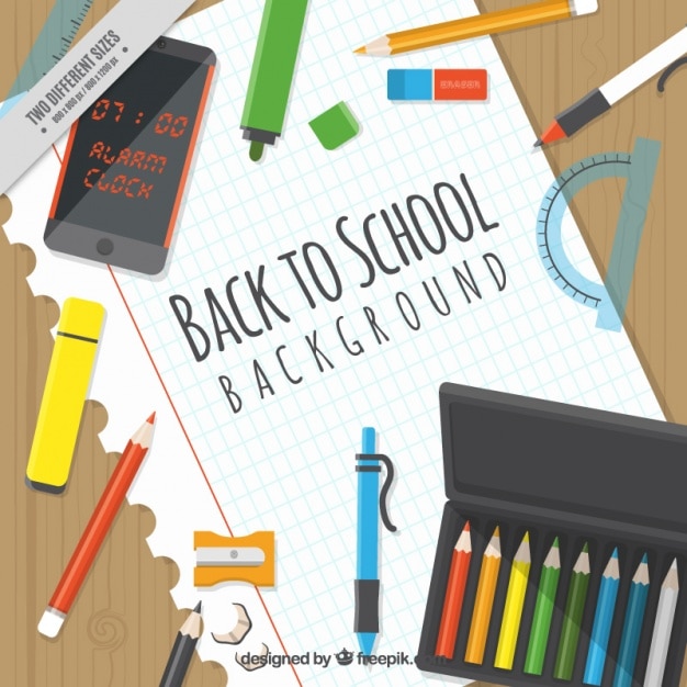 Free vector background with school supplies on a notebook