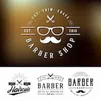 Free vector barber shop logos set