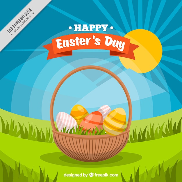 Basket background with easter eggs on the grass