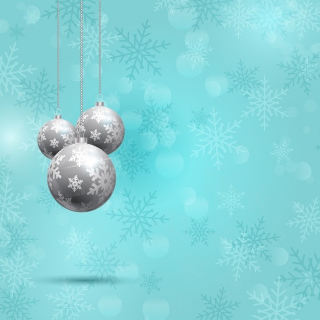 Baubles on snowflakes background