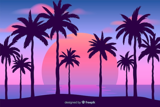 Beach sunset with palm silhouettes