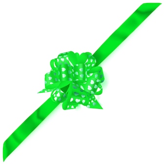 Beautiful big corner bow made of green ribbon with small shiny hearts with shadow on white background