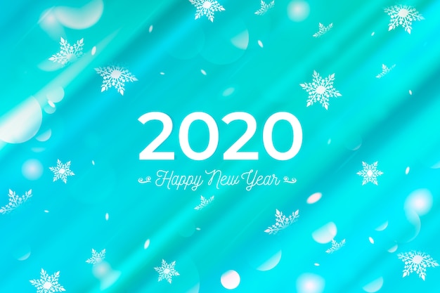 無料ベクター 美しいぼやけた新年2020年の背景