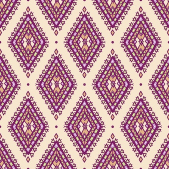 Beautiful graphic tribal color seamless pattern with purple and green rhombuses