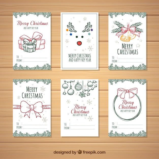 Free vector beautiful hand drawn christmas cards