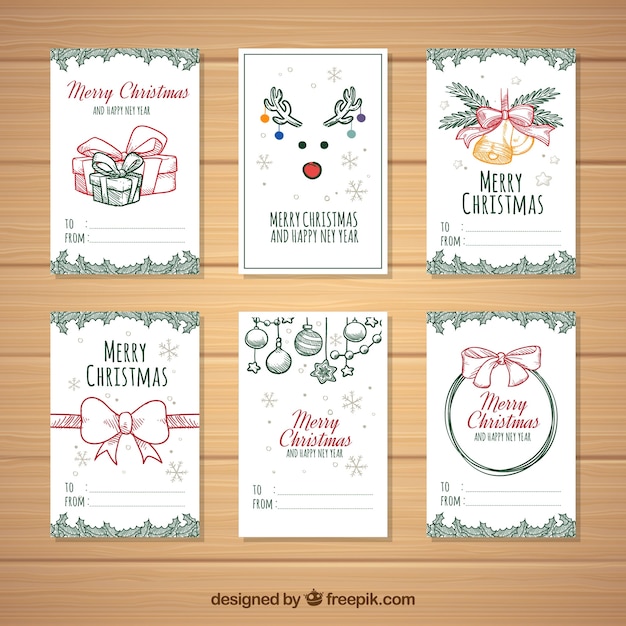 Free vector beautiful hand drawn christmas cards