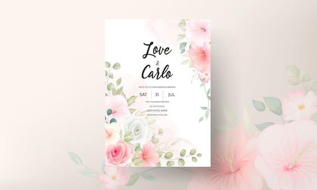 Free vector beautiful hand drawn floral wedding invitation card template