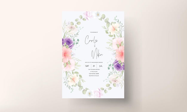 Free vector beautiful hand drawn floral wedding invitation card template