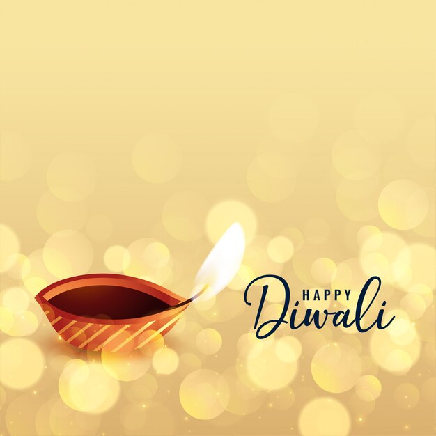 Beautiful happy diwali bokeh background with diya 