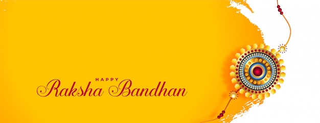 Free vector beautiful raksha bandhan banner with golden rakhi