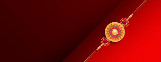 Free vector beautiful red raksha bandhan banner with golden rakhi