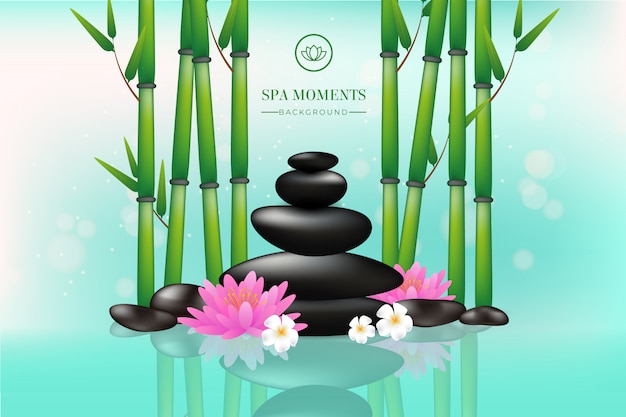 Beautiful spa background with stones, flowers and bamboo
