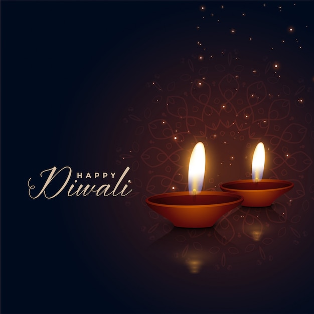 Beautiful two diwali festival diya on dark background