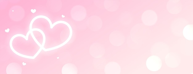 Free vector beautiful two neon glowing white hearts on pink bokeh background