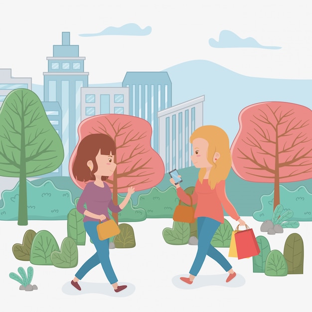 Free vector beautiful women walking in the park using smartphones