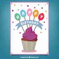 Free vector birthday card with cupcake in hand drawn style