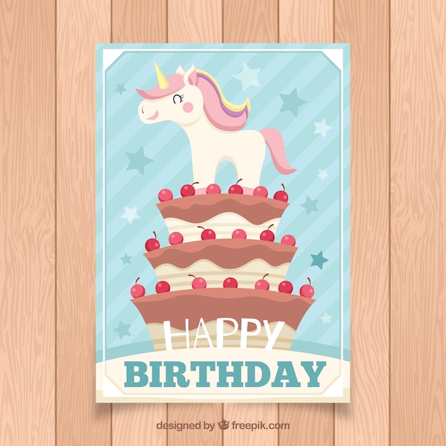 Vettore gratuito scheda di compleanno con un unicorno su una torta
