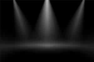 Free vector black background with three focus stage lights effect