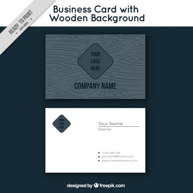 Black business card with a wooden background