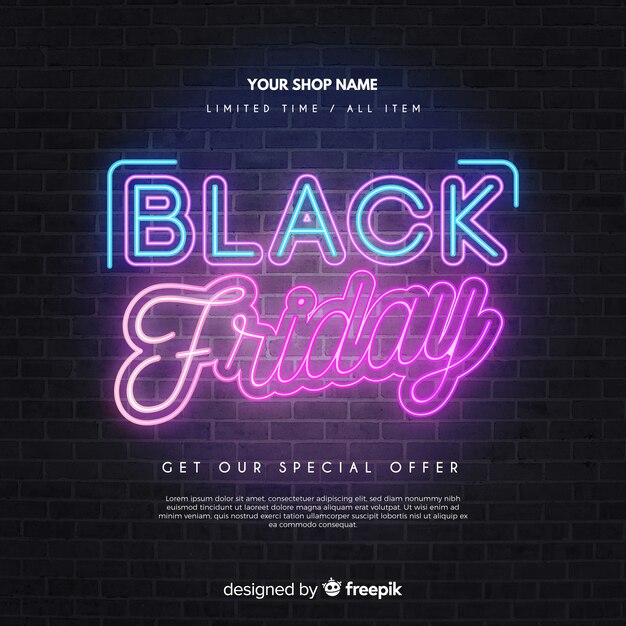 Black friday in neon lights on brick wall