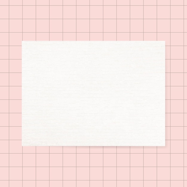 Blank white notepaper  on pink grid background