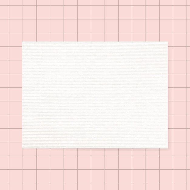 Blank white notepaper  on pink grid background