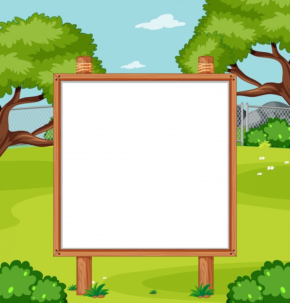 Blank wooden frame in nature park scene