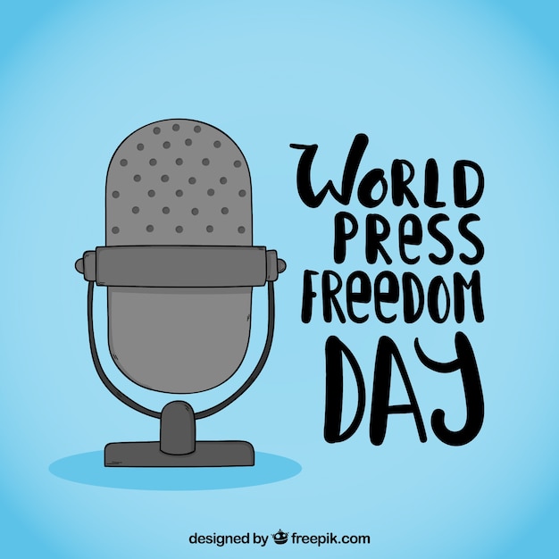Vettore gratuito sfondo blu con il microfono per il giorno della libertà di stampa mondiale