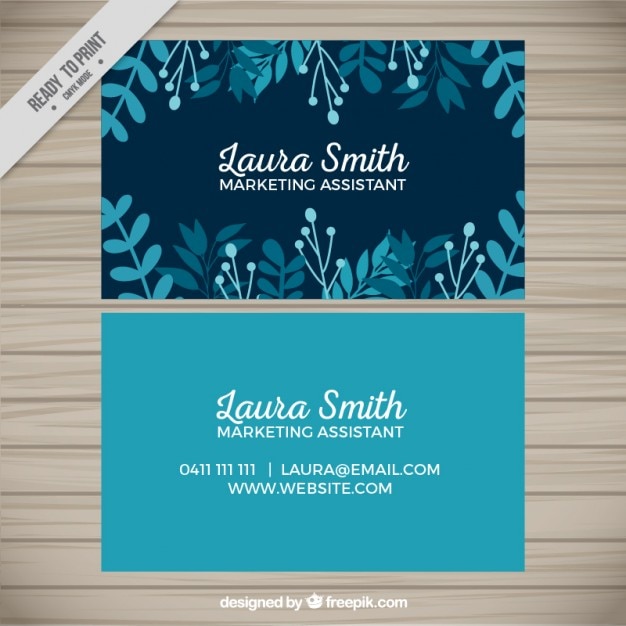 Blue business card with floral elements