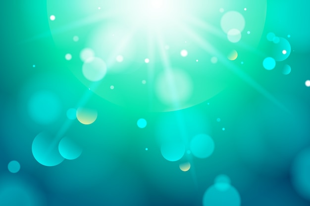 Бесплатное векторное изображение Синий градиентный фон с эффектом боке