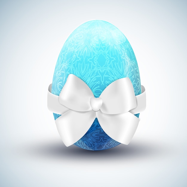 Free vector blue happy easter egg with white silken bow realistic vector illustration